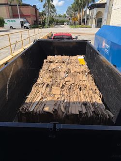 Bale of cardboard flat cardboard big small