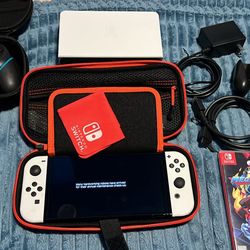 NINTENDO SWITCH OLED WITH DOCKING STATION, EXTRA CONTROLLER, MEMORY CARD & MEGAMAN 11