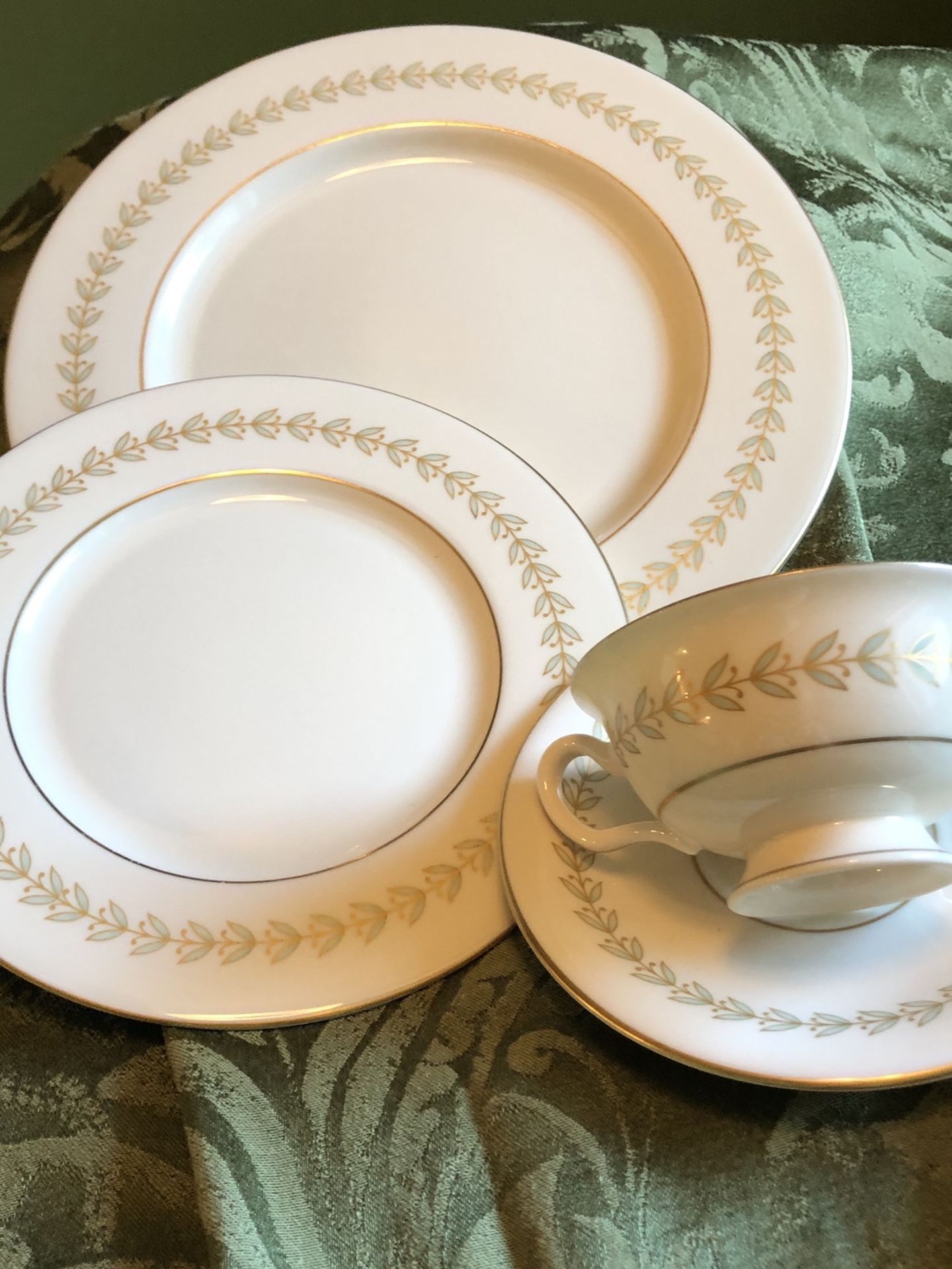Grosvenor pattern by Castleton, 12 dinner plates, 5 salad plates, 10 cups & Saucers.
