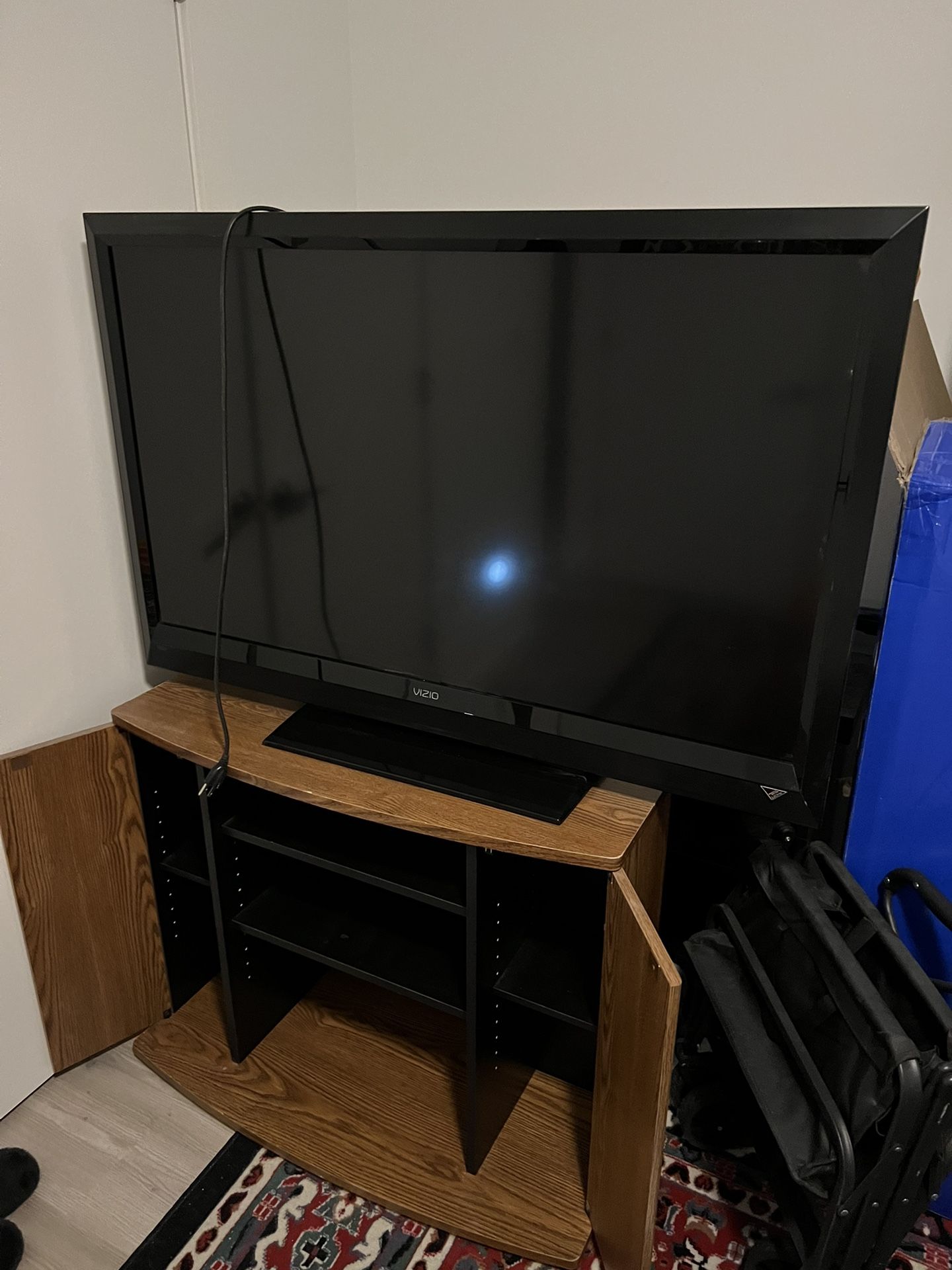 47 inch TV and Entertainment center