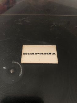 Yamaha CR-420 receiver…two generic speakers (30”x15”x10”). Marantz turntable.