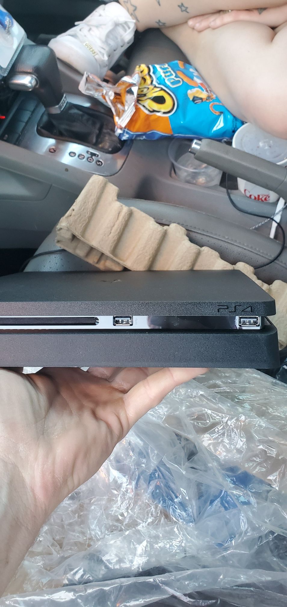 Playstation 4 brand new hasn't been used once, has all the cable and cords it needs to work and has a controller
