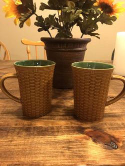 Two brown tall basket weave look coffee mugs WCL cups