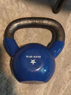 Blue kettlebell weighing 15 LB (6.8 KG