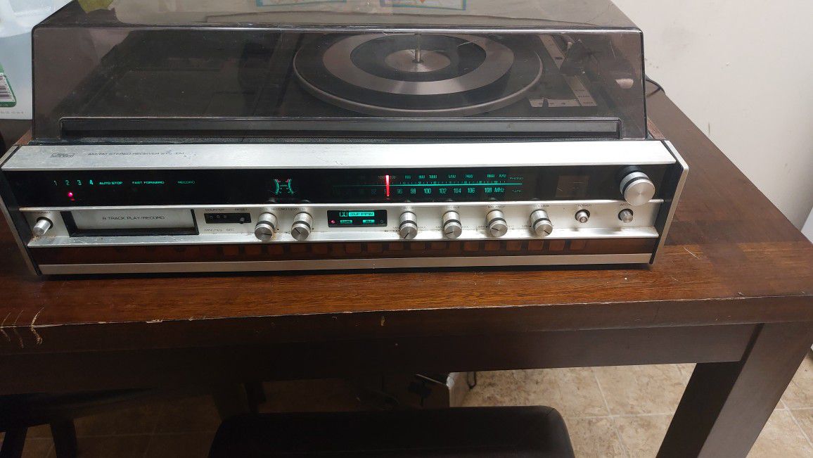 sear solid state 8 track am/fm stereo receiver system 132.(contact info removed)0, turns on record player works, 8 track player untested,  cosmetic we