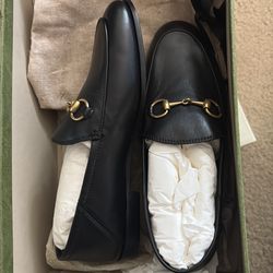 Gucci black leather horsebit loafers