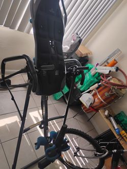 Teeter back and spine corrector / inverter