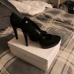High heels  ( Size 7 )