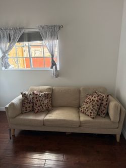 Beige Sofa Couch with Pillows