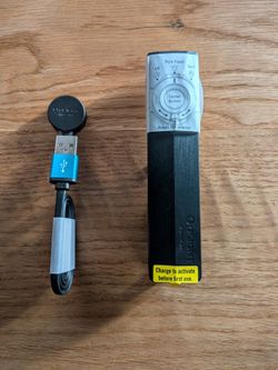 Olight arkpro ULTRA Flashlight with Magnetic USB Charger