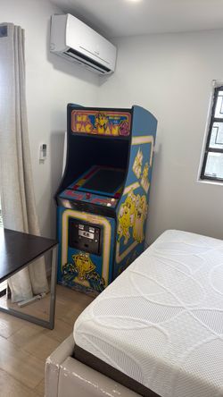 Free ms pacman and queen bedframe