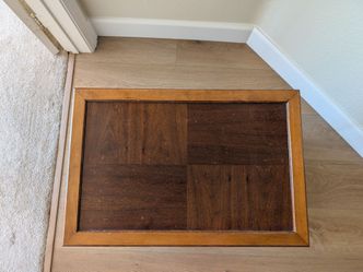 Handmade wooden rolling side table.