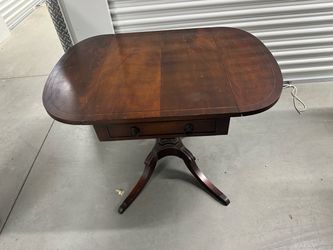 Antique solid wooden table with one drawer both side down leaf