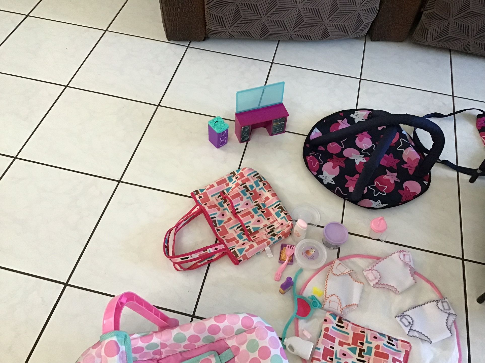Toys like new, playpen, stroller, washing machine and dryer that make noise, bags, cloth diapers, cup and various other very nice and clean items
