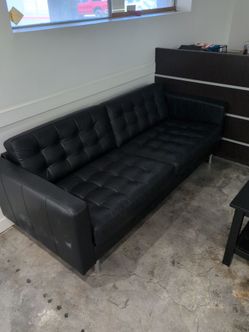 Black Tufted Leather Sofa with Chrome Legs