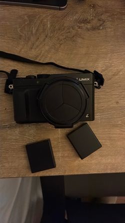 Panasonic LUMIX X100 / with extra Battery and charger