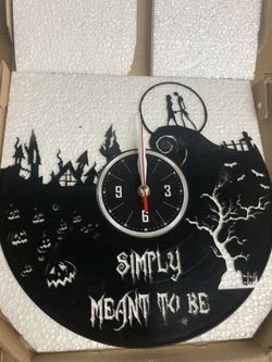 Nightmare Before Christmas Jack And Sally Clock On Vinyl Album Pretty cool for a gift.