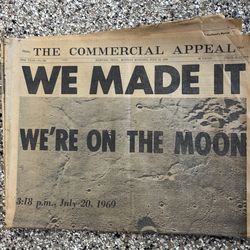 The moon landing newspaper.