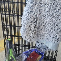 Dog starter bundle: wire crate, shaggy bed, Wahl Odor Control shampoo, Wonder Woman costume, and Sunkoon pooper scooper set
