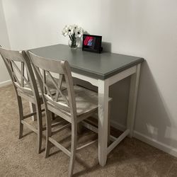 Bar Height table and (2) Chairs