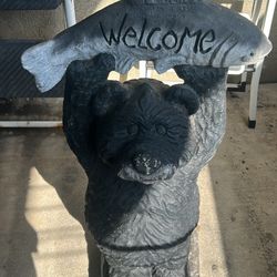 Bear with welcome sign