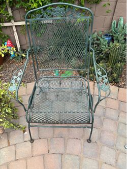 Two iron rocking chairs