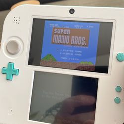 Nintendo 2ds With Pokémon, Mario And Other Games 