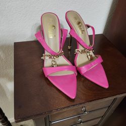 Hot pink high heels for women size 9.