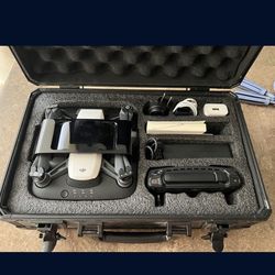 DJI Spark With 3 Batteries, Portable Charger, And Case.