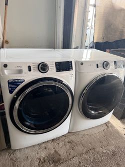 He front load washer and electric dryer set