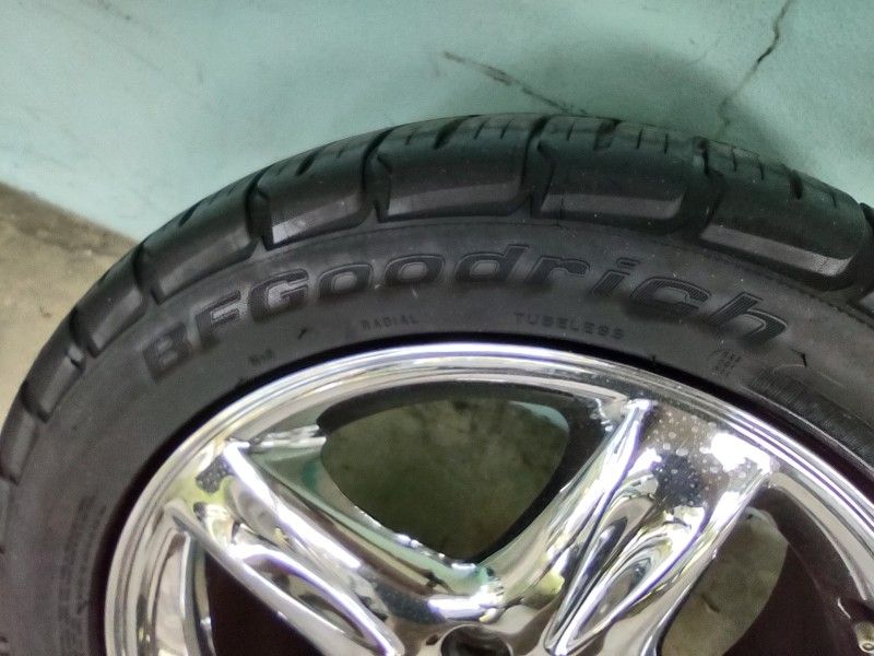 Used BF Goodrich Tires And Original Manufacturer Chrome Rims For A Lincoln LS