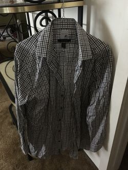 Black and white button-up long-sleeve polo