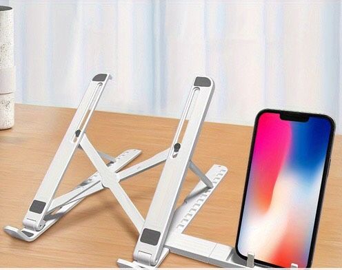 Holder for laptop computer tablet and cell phone