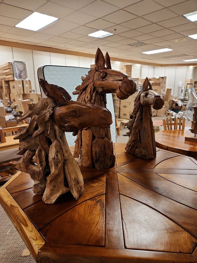 Beautiful hand carved solid teak, wood, horse heads small and large available.