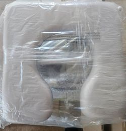 Raised toilet seat