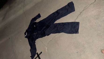 Flame resistant coverall suit