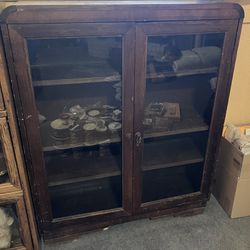 Dark solid wood vintage glass front bookcase 