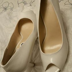 Brand new white high heels 