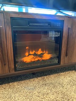 Tv stand with fire place
