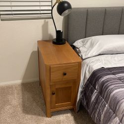 lamp and wood nightstand