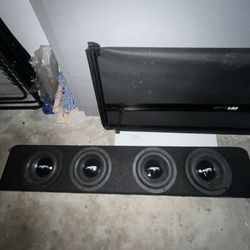 4 8-inch subwoofers with skar audio brand box