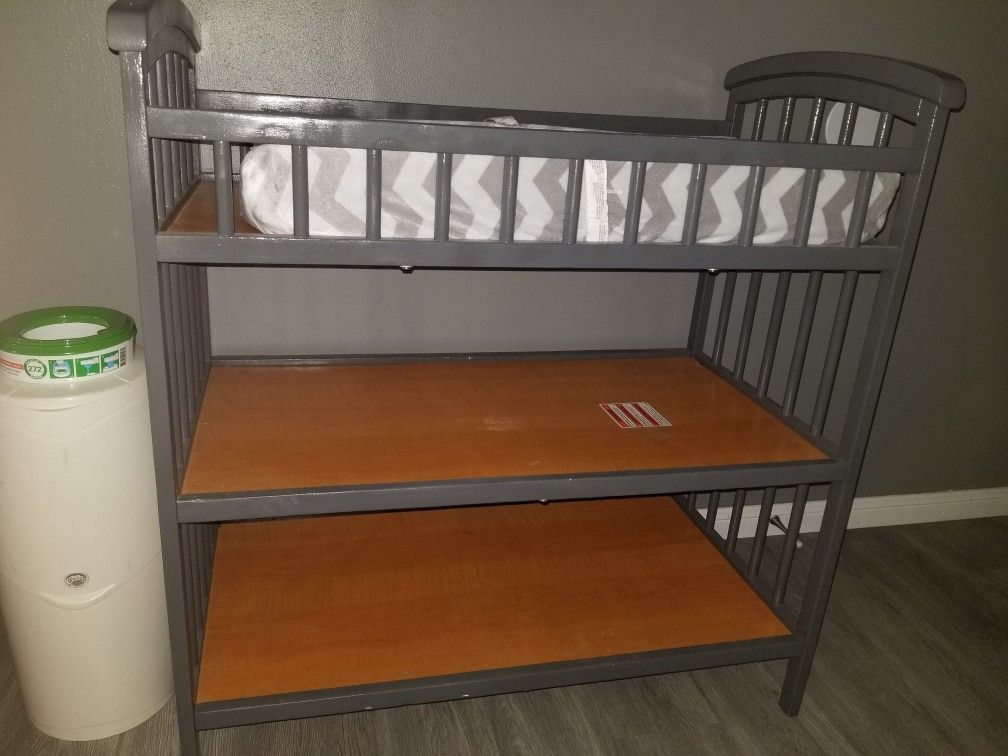 Gray changing table