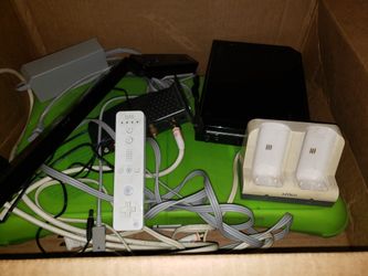 Wii and Wii Fit all remotes included