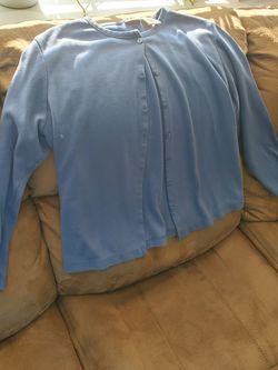 Women's size medium sweater and under shirt. Smoke and pet free home.