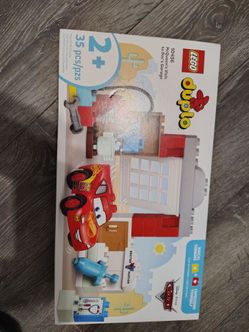 Lego Disney Pixar cars  mc queens visit to doc garage