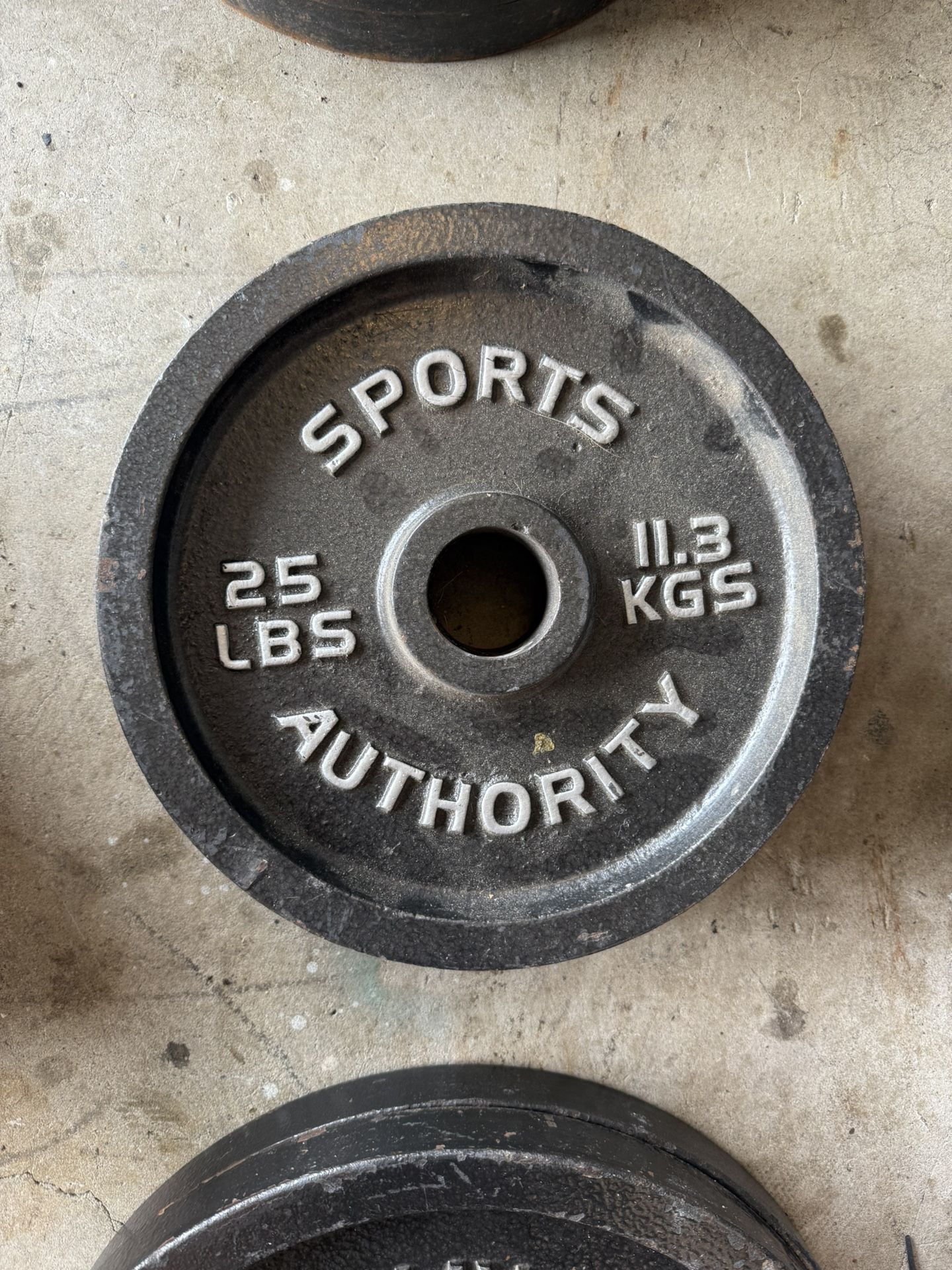Set of two 25lbs Olympic barbell weight plates