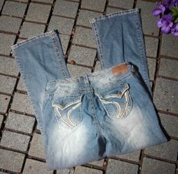 Ariya White Washed Distressed Flap Embroidered Back Pocket Flare Leg Jeans (14)