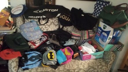 over 40 asst bags tool bags baseball bags backpacks large and small