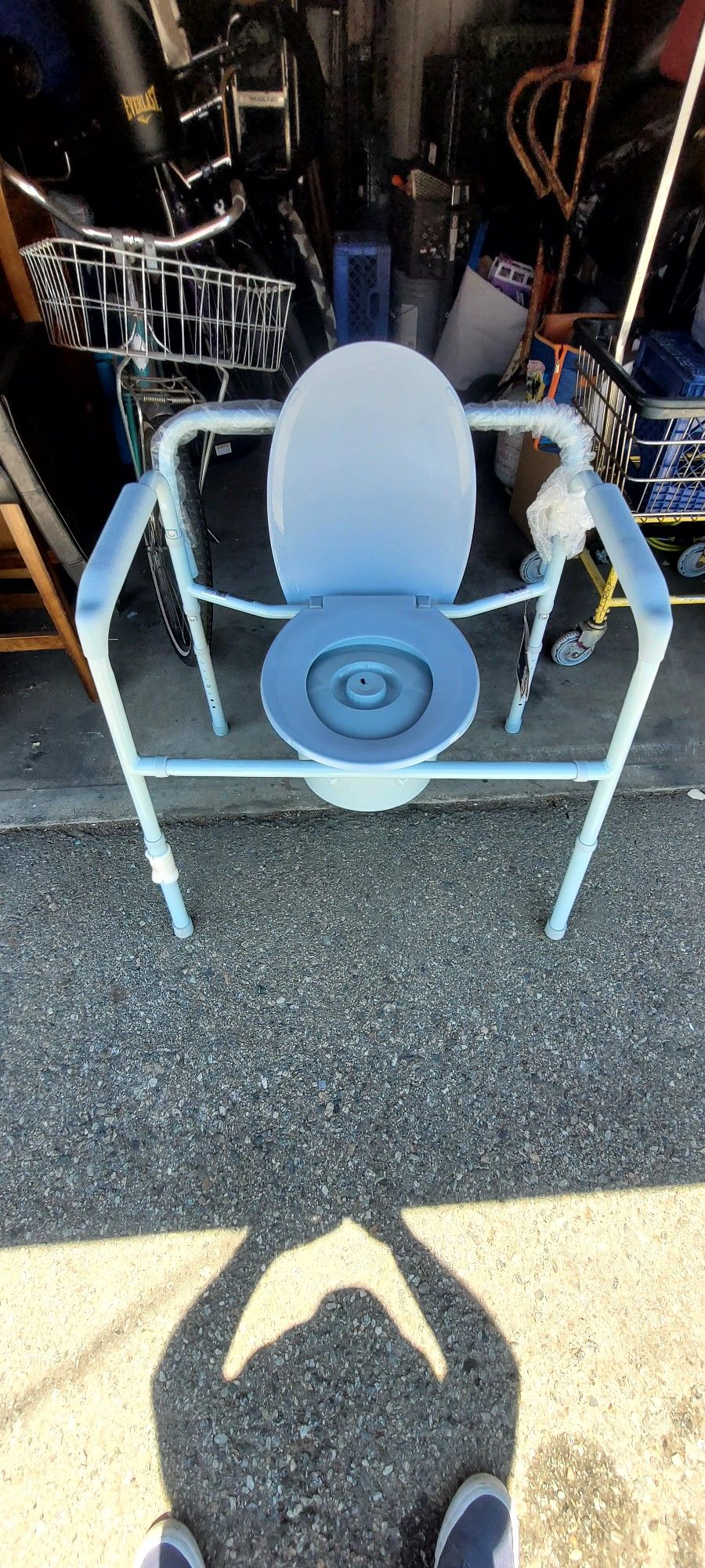 THIS IS FOR OLDER PEOPLE PORTABLE TOILET FOR YOUR OR HOUSE NEVER USED IT WAS