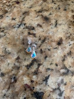 Sterling silver...they change color with the light